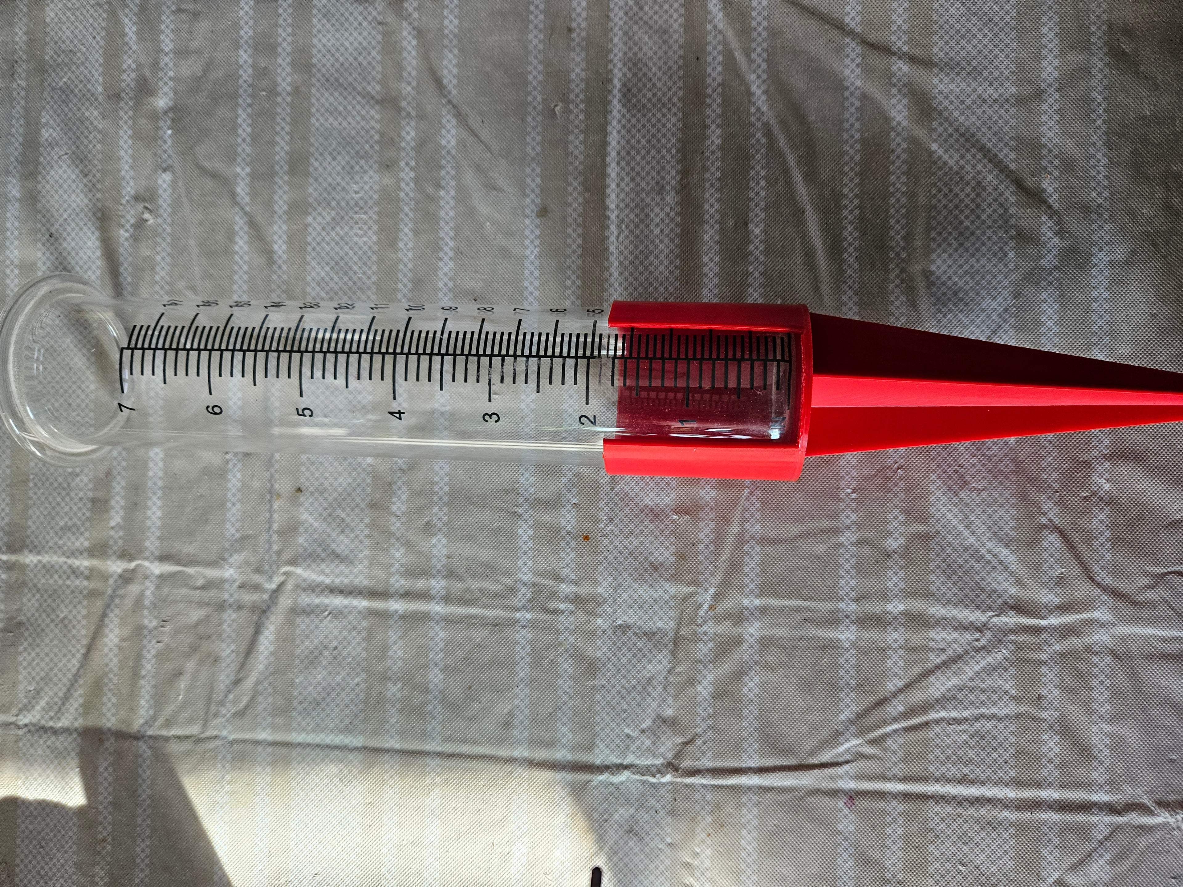 Rain gauge holder