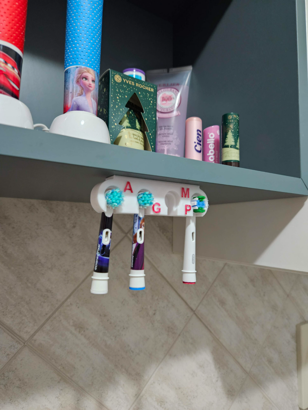 Electric toothbrush head holder