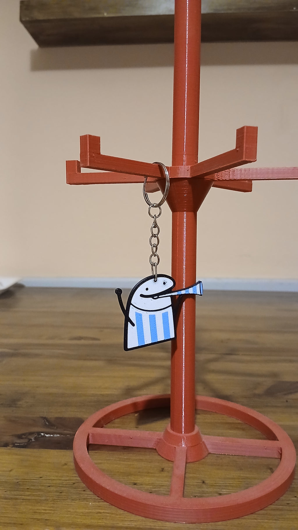 Llavero flork tocando la corneta mundial