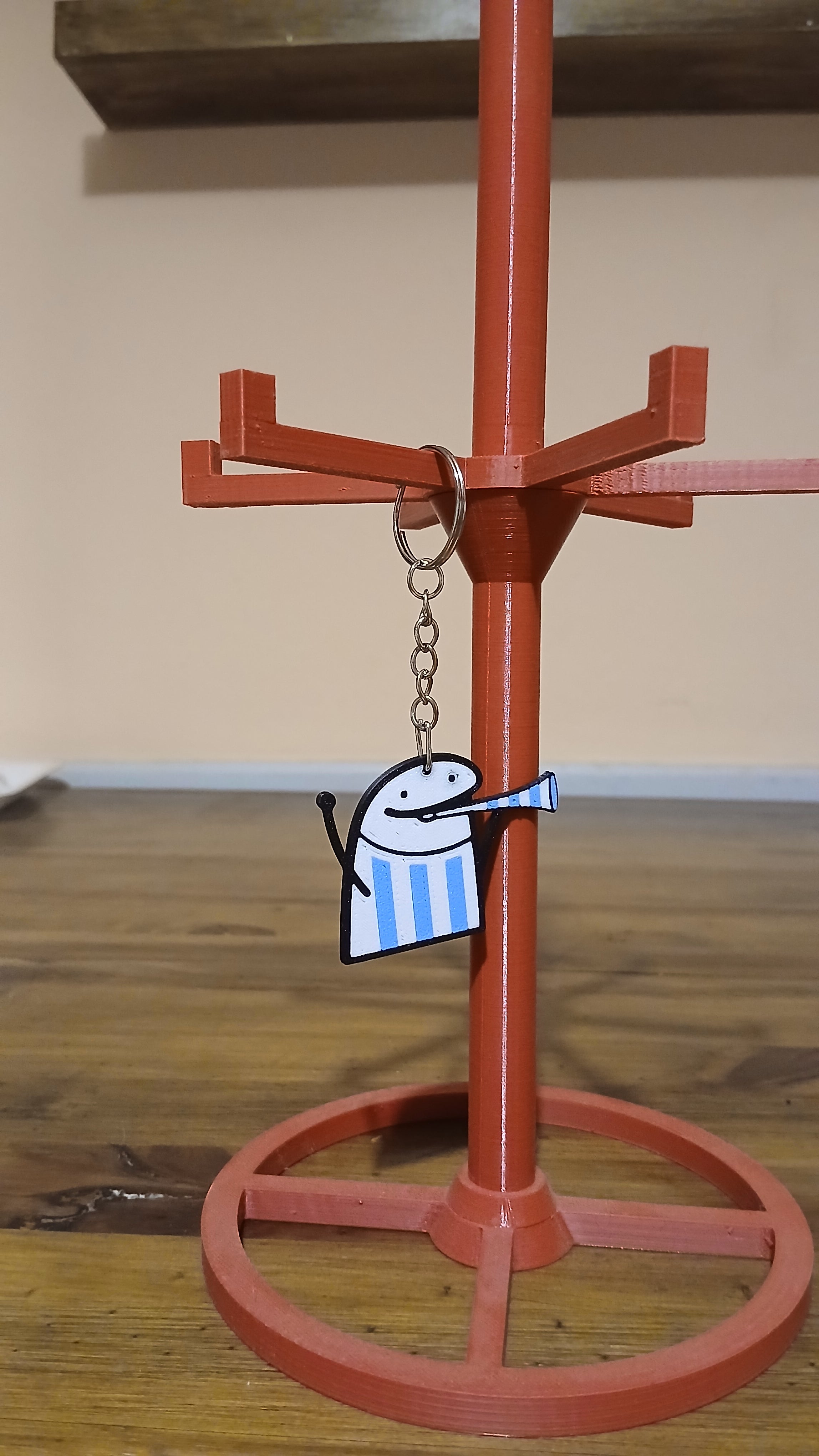 Llavero flork tocando la corneta mundial