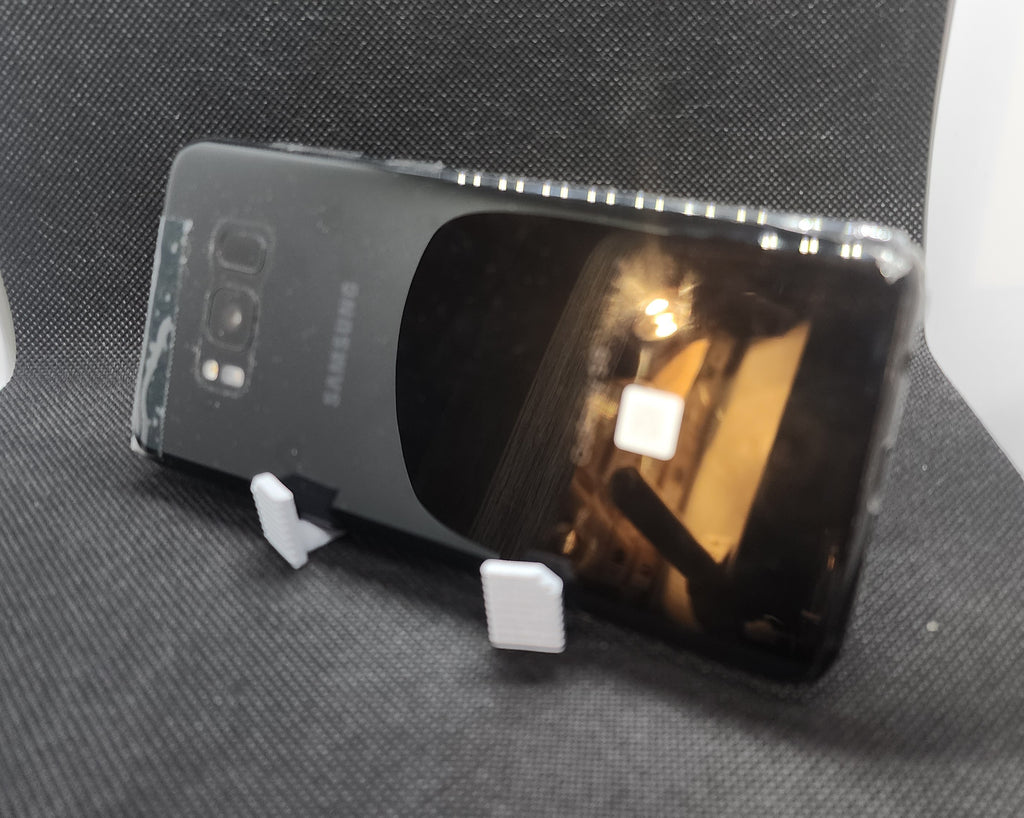 Tired Bot Phone & Tablet Stand