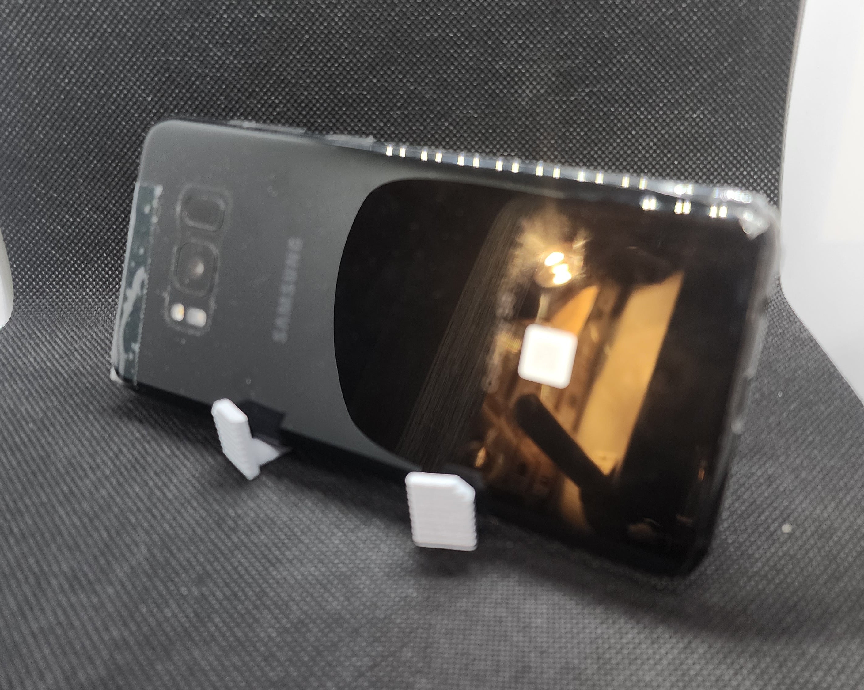 Tired Bot Phone & Tablet Stand