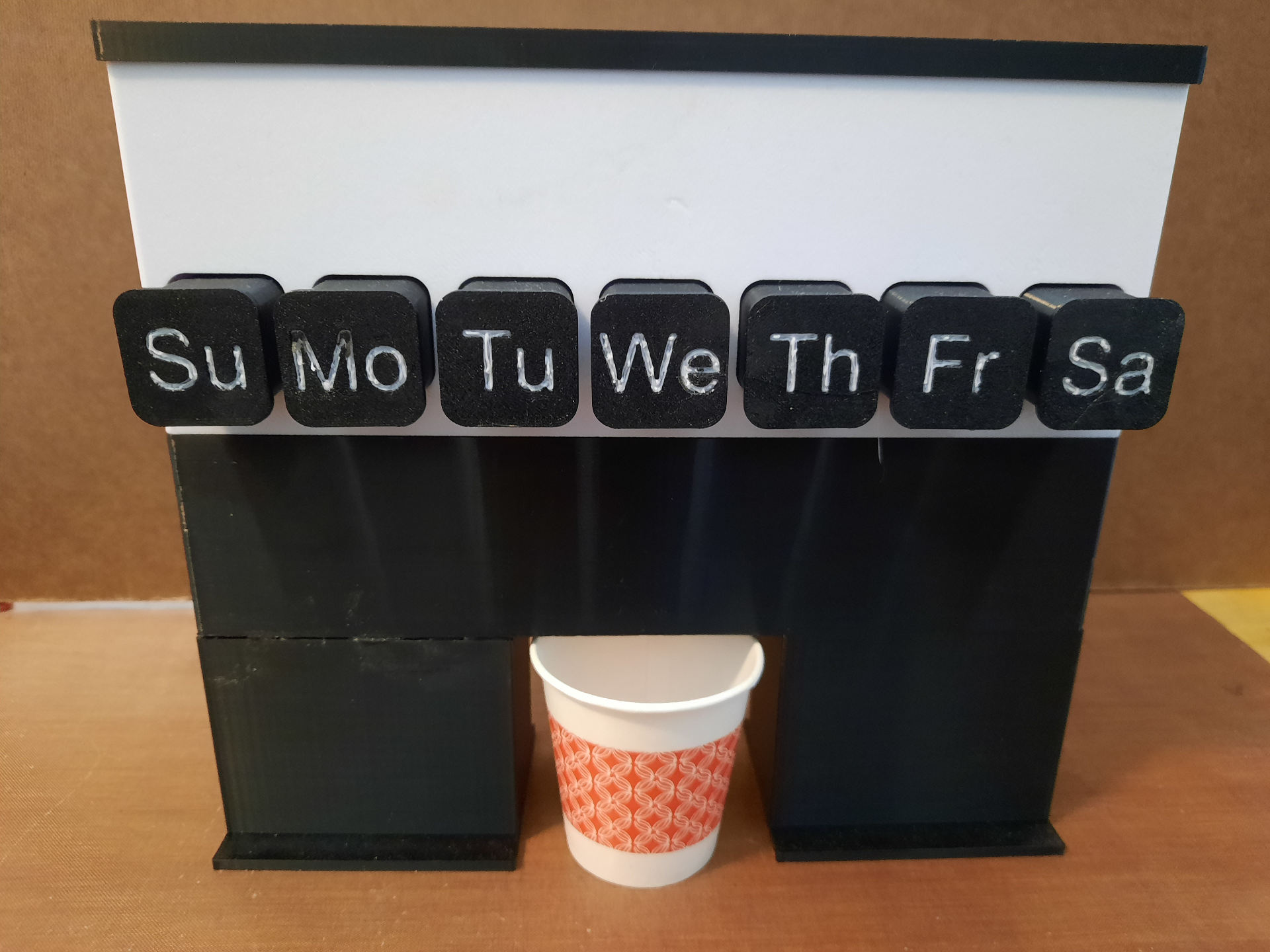 Base modified for cup to catch pills