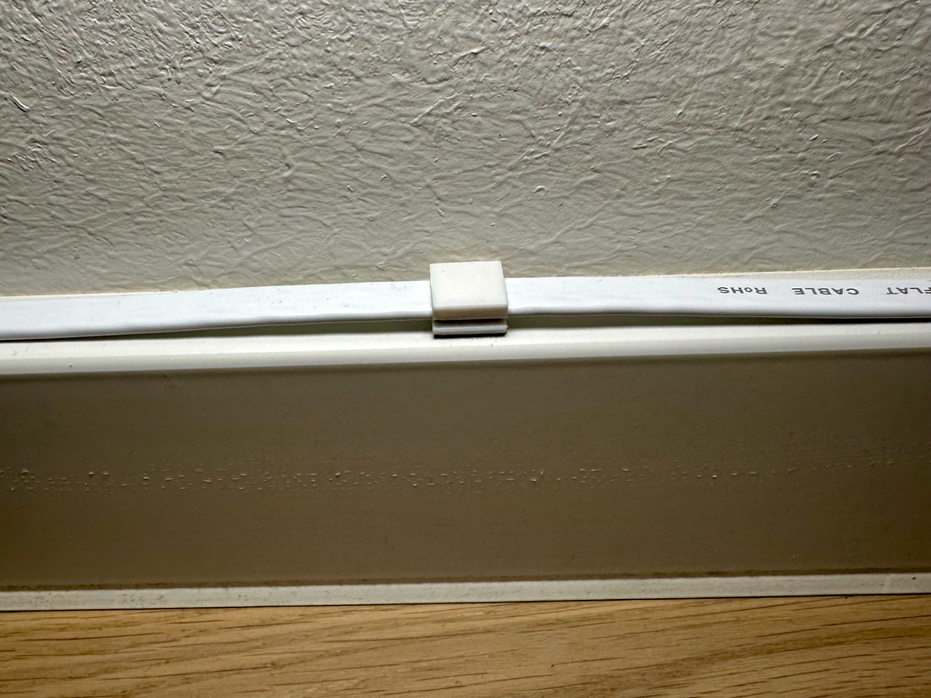 Flat LAN cable clips/mounts