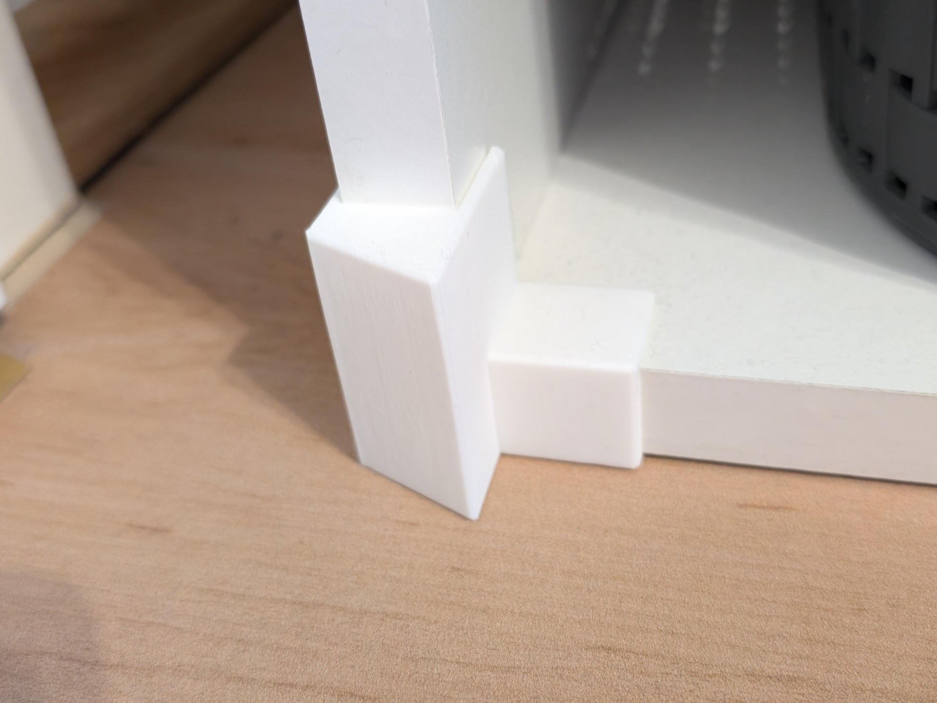 Cupboard mounted door stopper / bumper
