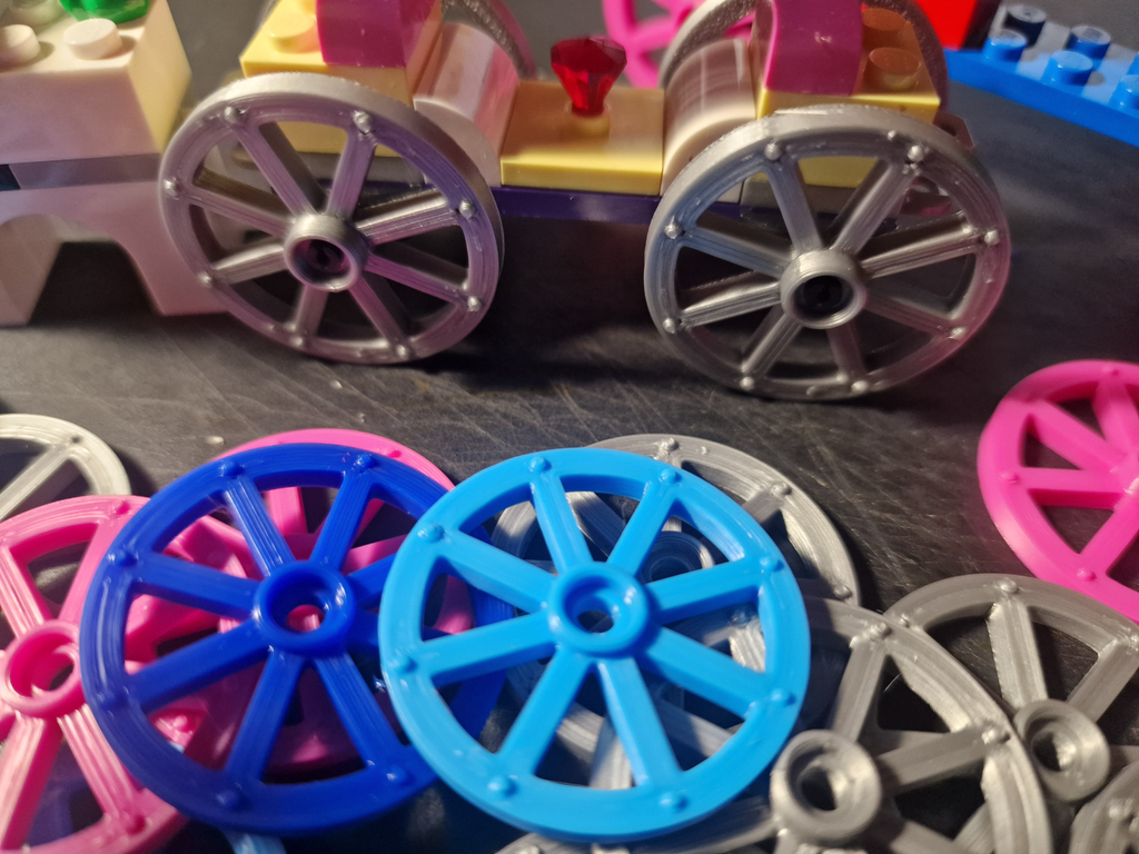 Chariot wheels for bricks construction set