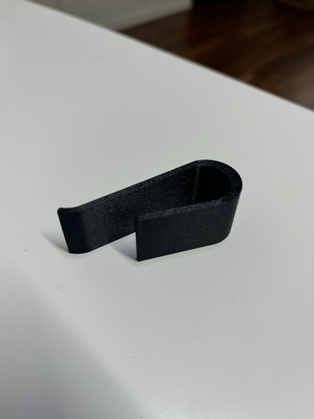Sun visor clip for any garage remote control