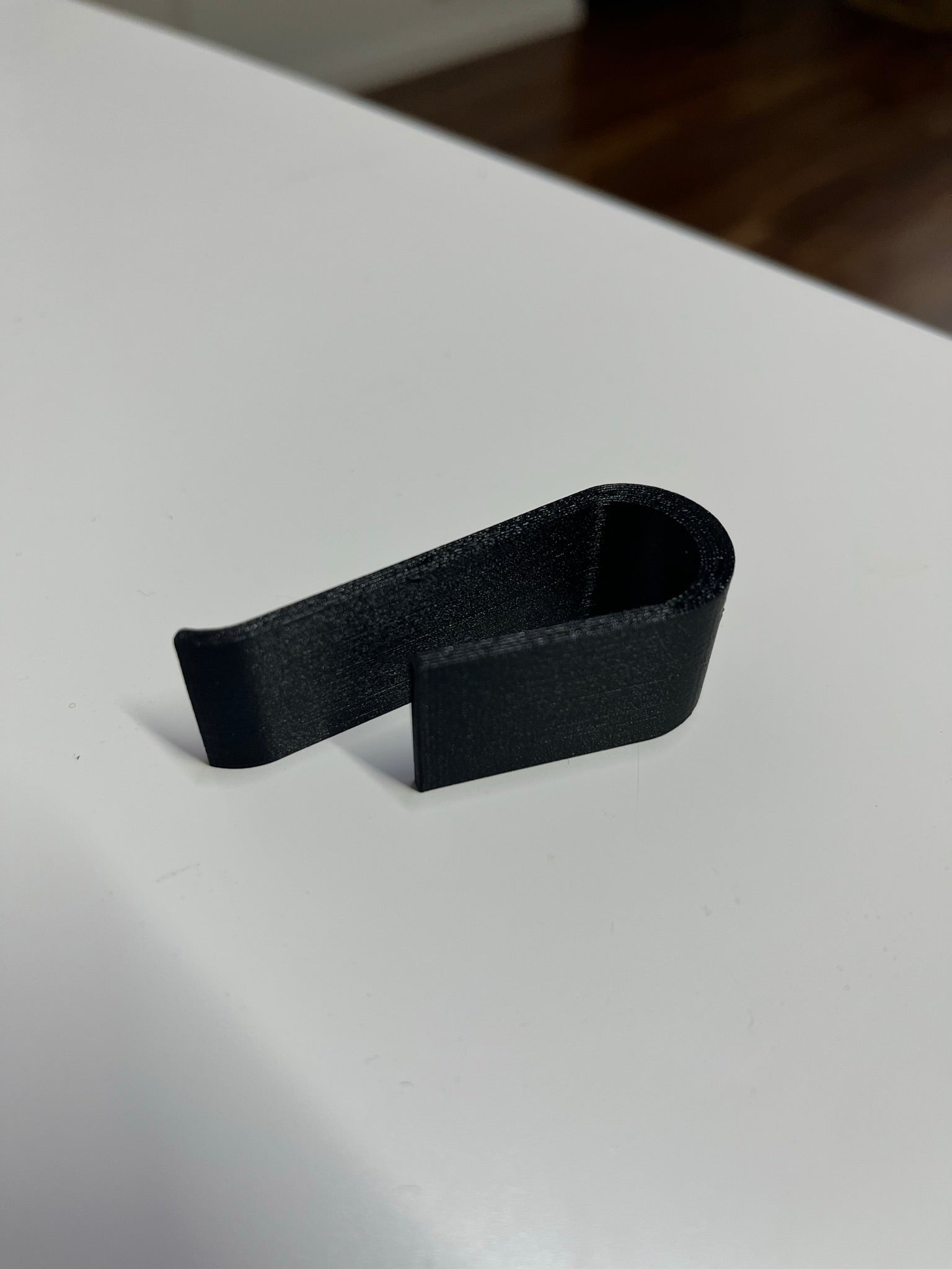 Sun visor clip for any garage remote control