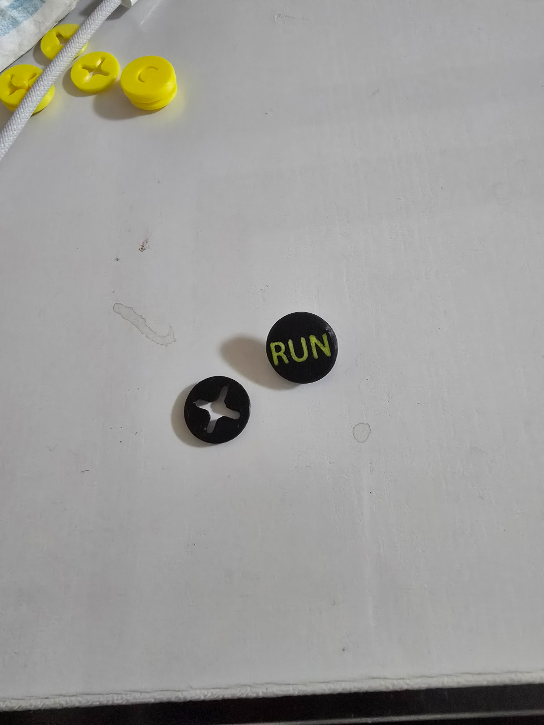 Marathon bib number clip run button
