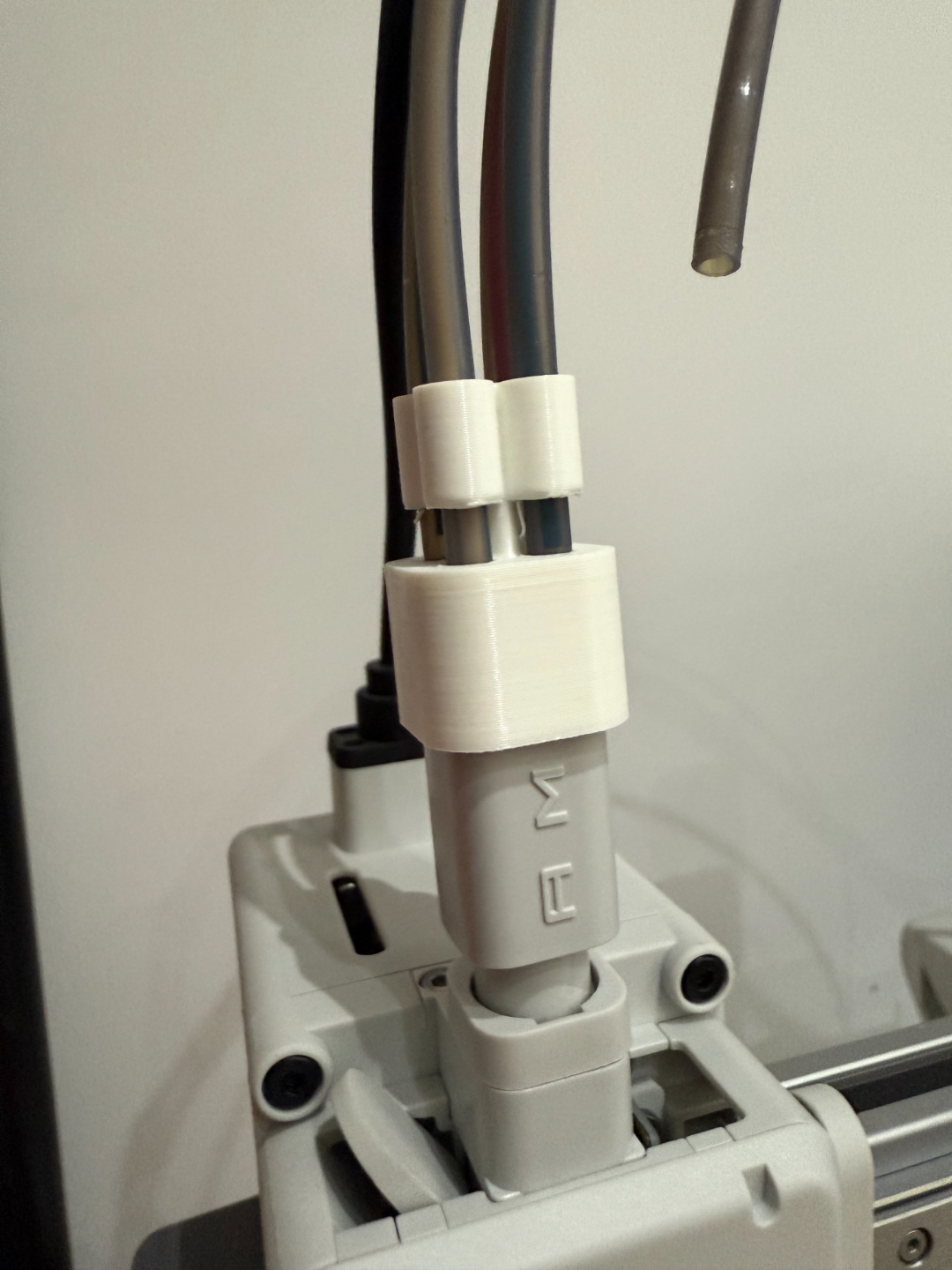 Sujetatubos ptfe al AMS LITE