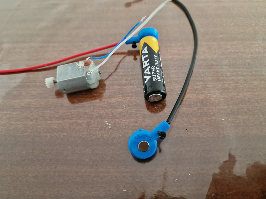 UNIVERSAL BATTERY HOOK AND CONNECTOR WITH MAGNET