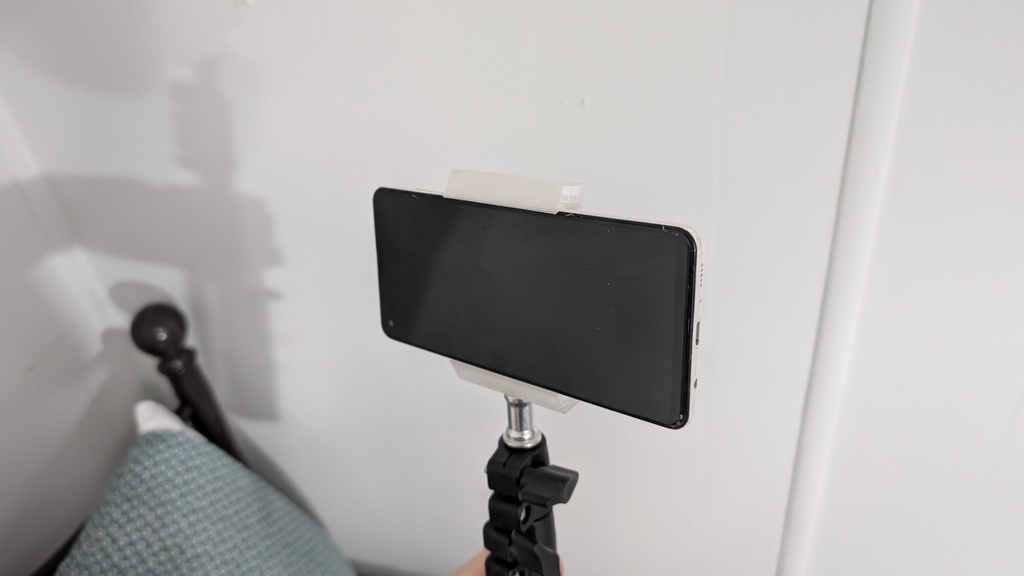Phone holder for tripod
