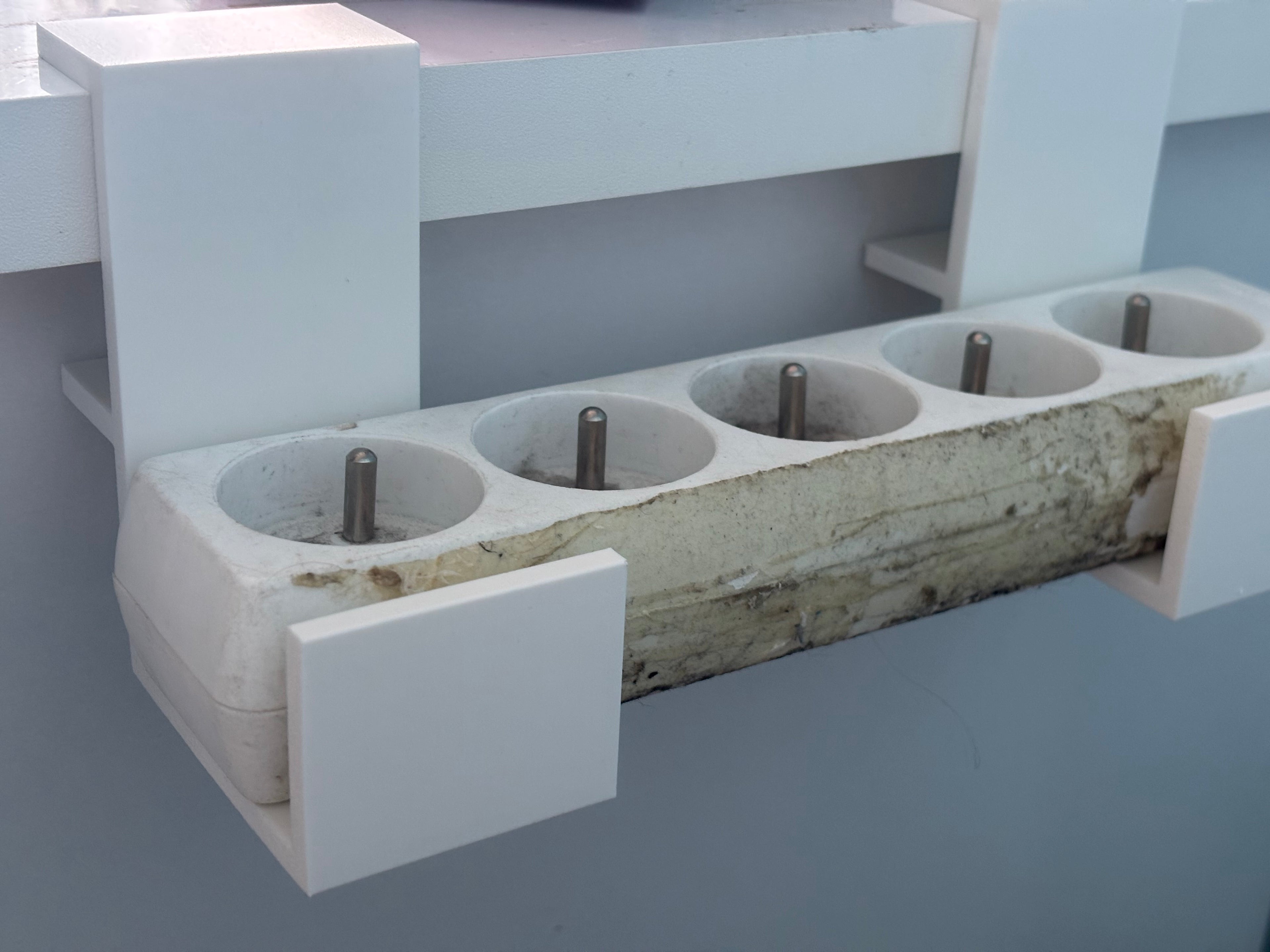 Power strip holder under desk