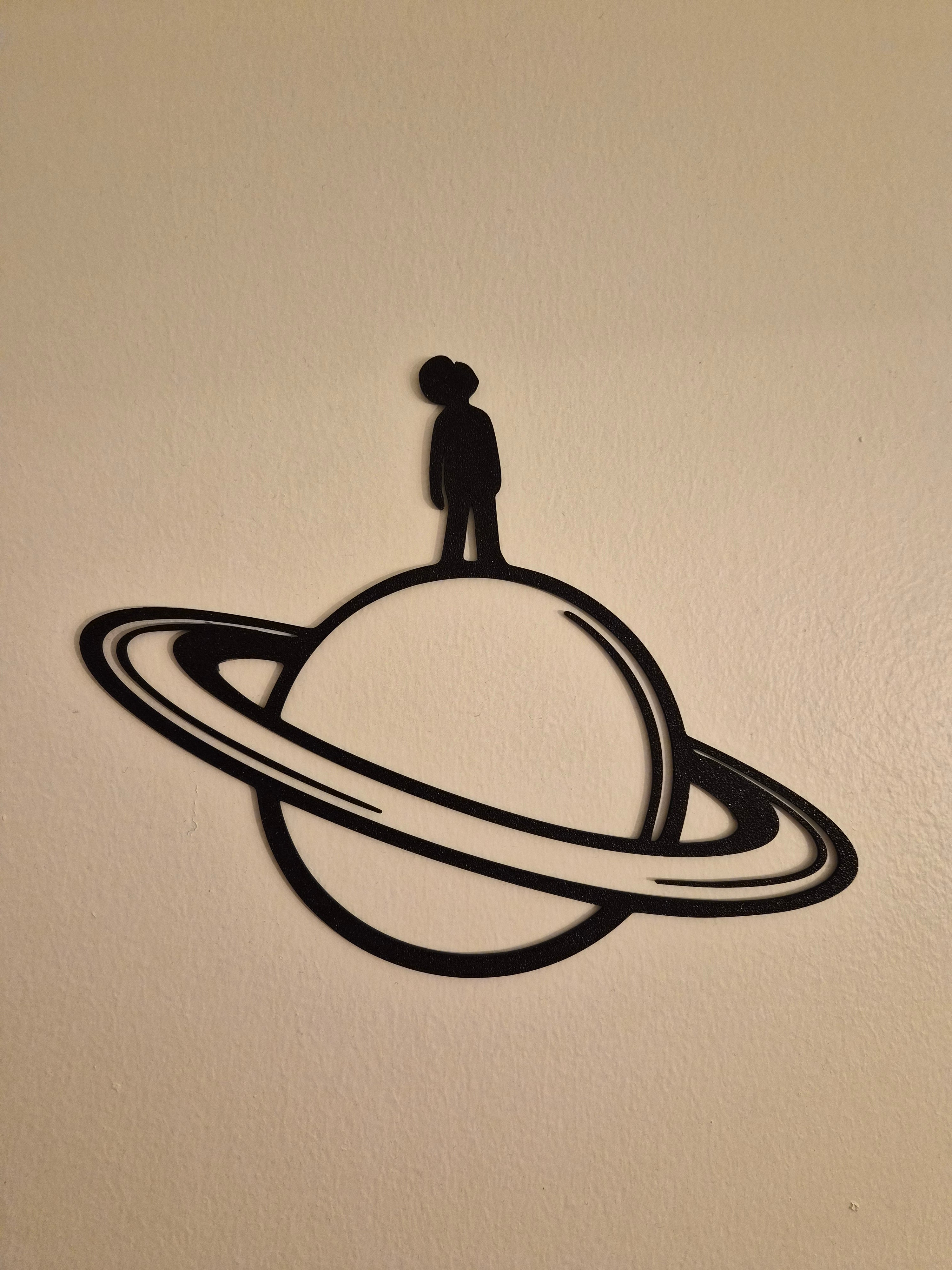 Man on Saturn Wall Art