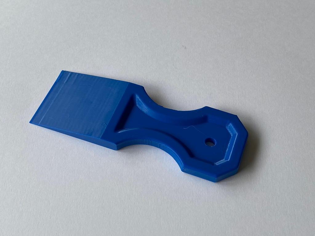 Improved scraper