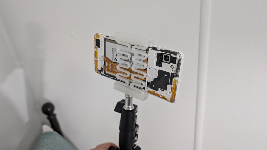 Phone holder for tripod