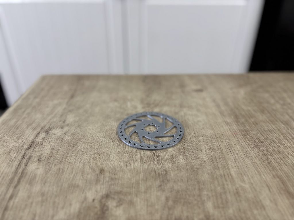 Bike brake rotor coaster