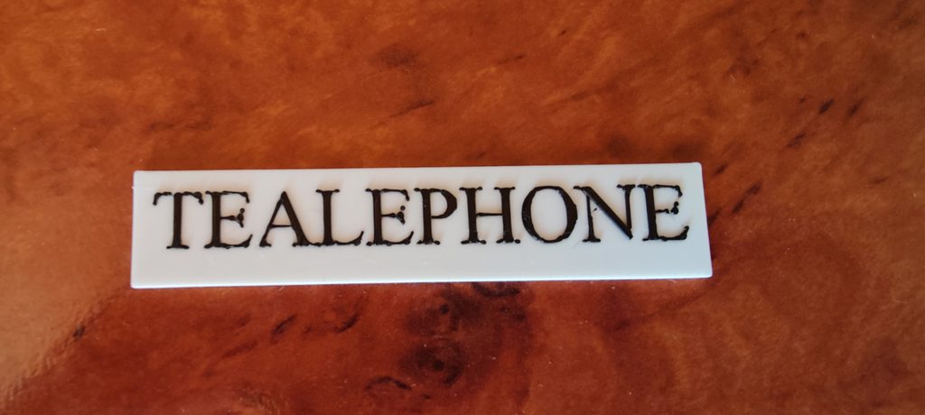 TEALEPHONE sign