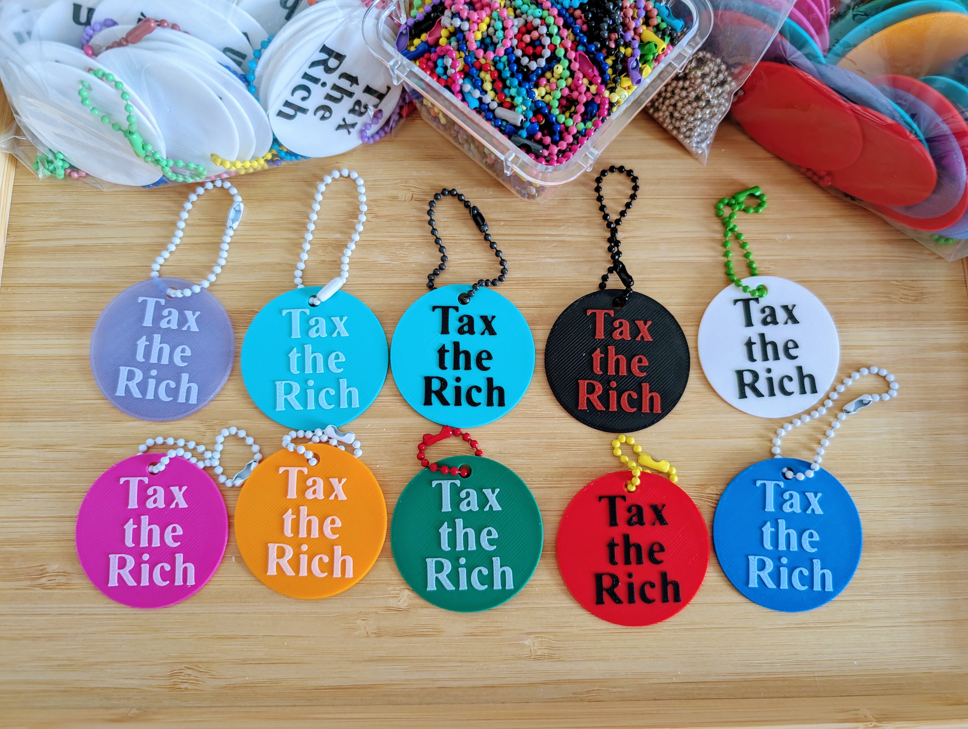 Tax the Rich Keychain in Times New Roman Font