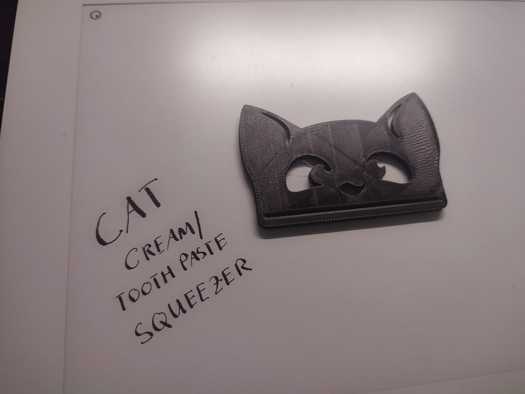 Cat design cream or toothpaste squeezer