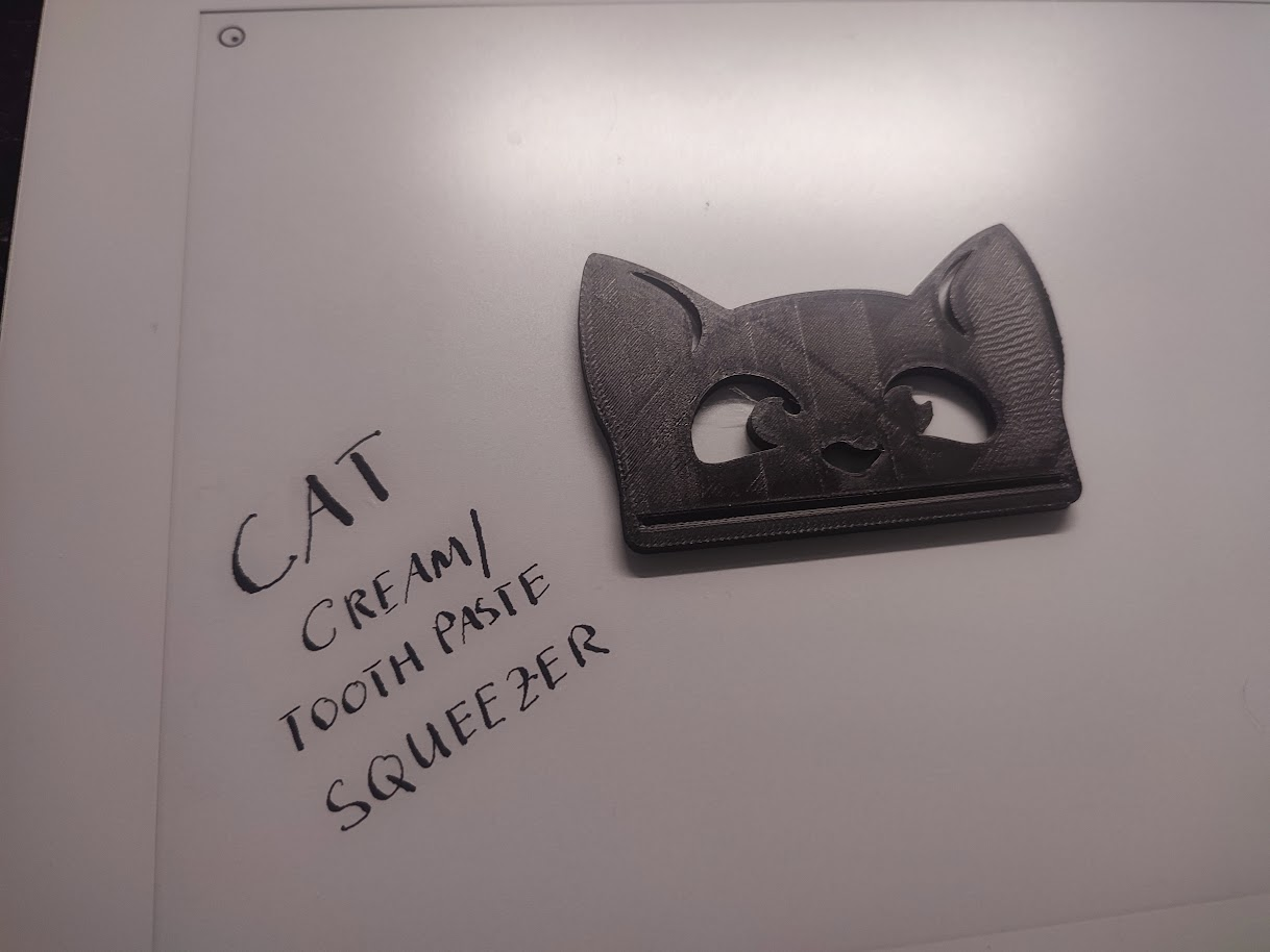 Cat design cream or toothpaste squeezer