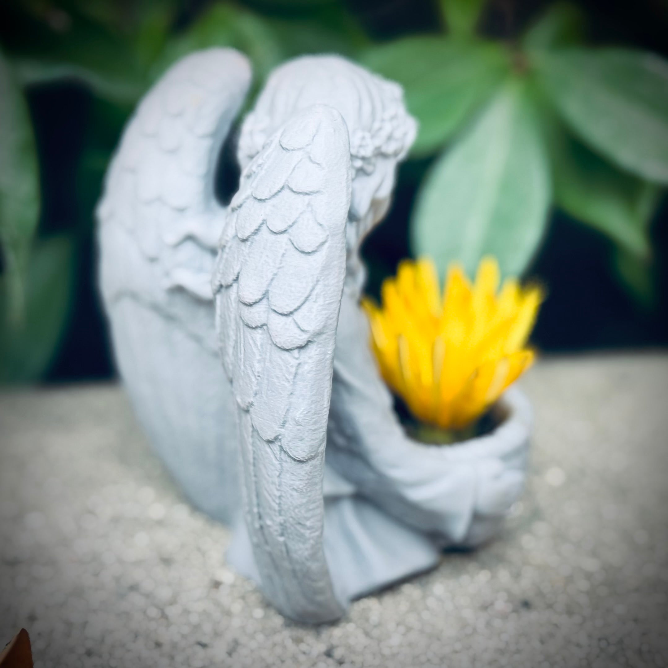 Angel Holding A Basket