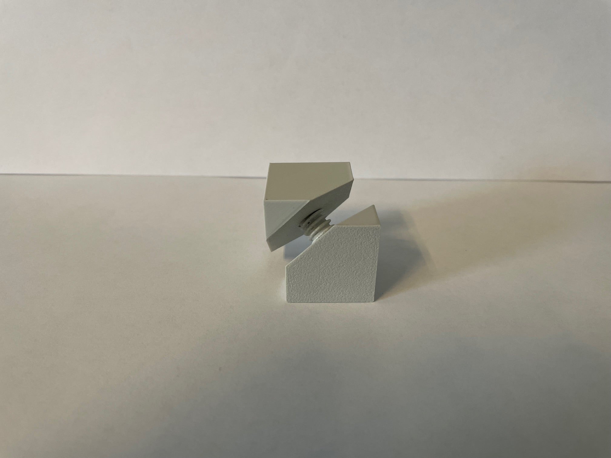 Sliced cube with screw as joint