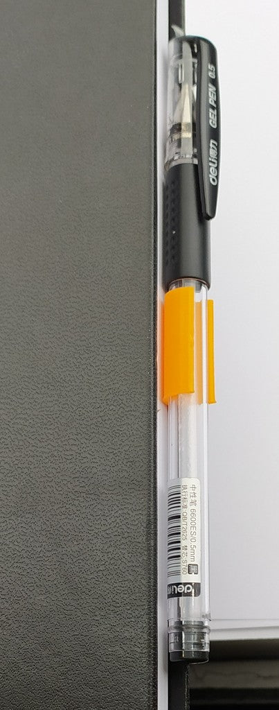Notebook pen holder