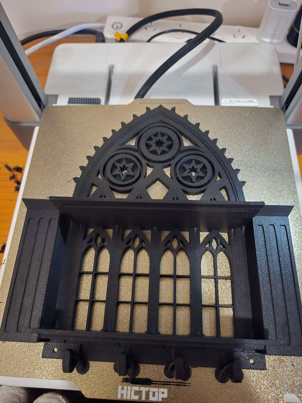 cathedral window shelf with key hooks and vases