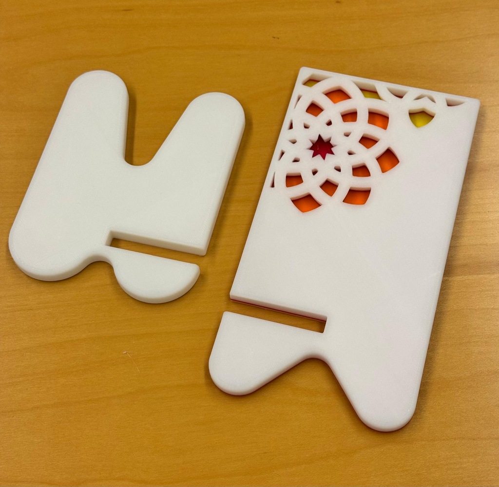 Elegant phone stand with engraved design pattern