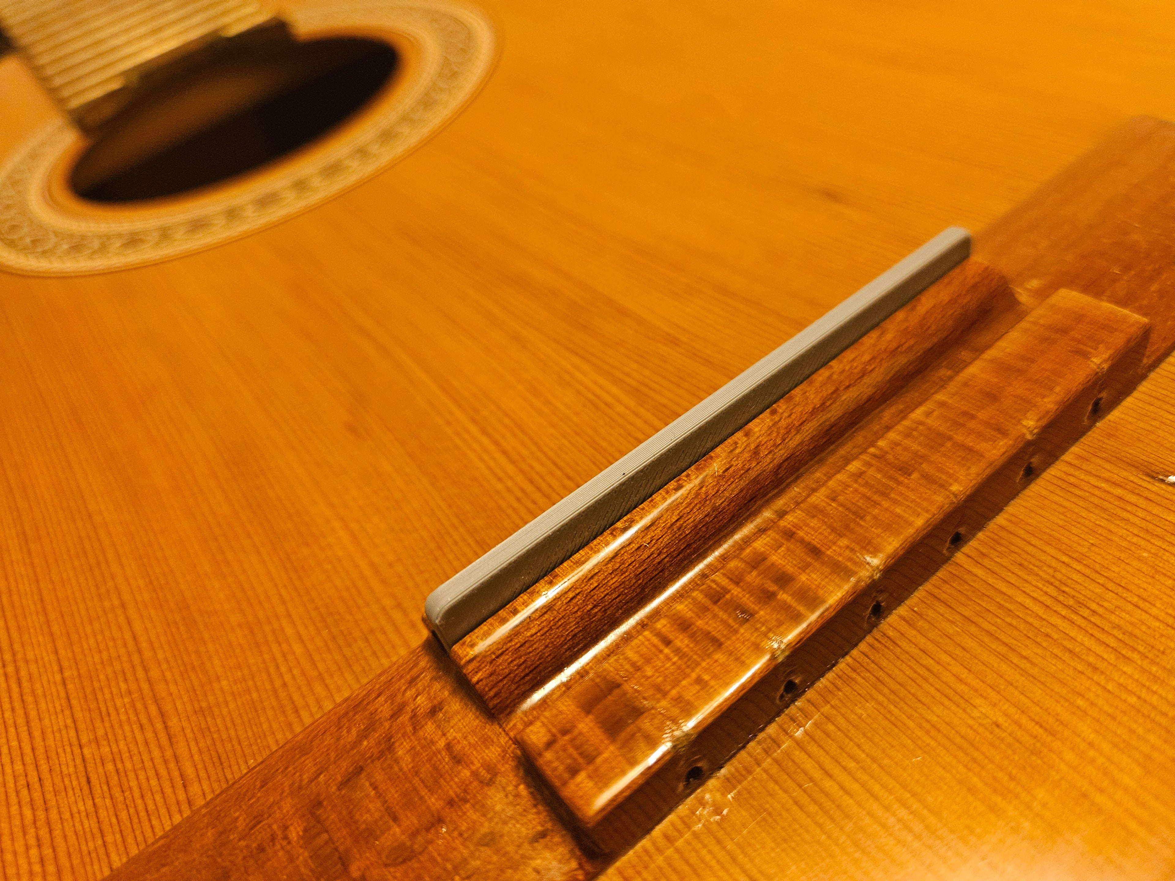 Classical guitar lower bridge