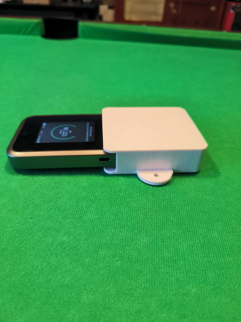 Wall mount for ZTE MU5120 router.
