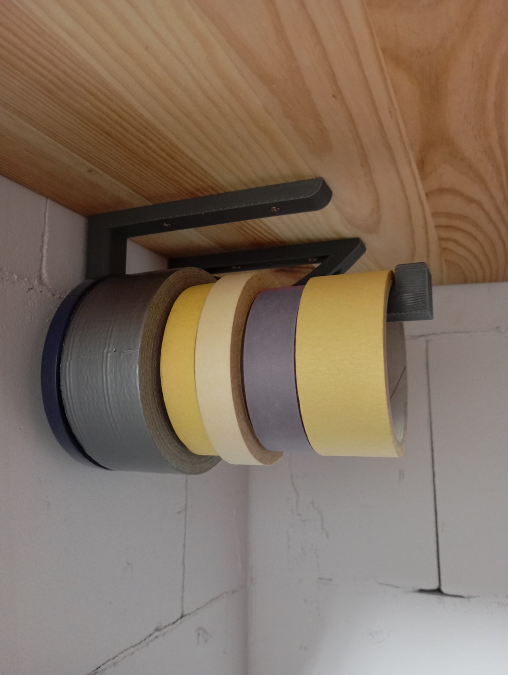 Tape holder top mounted