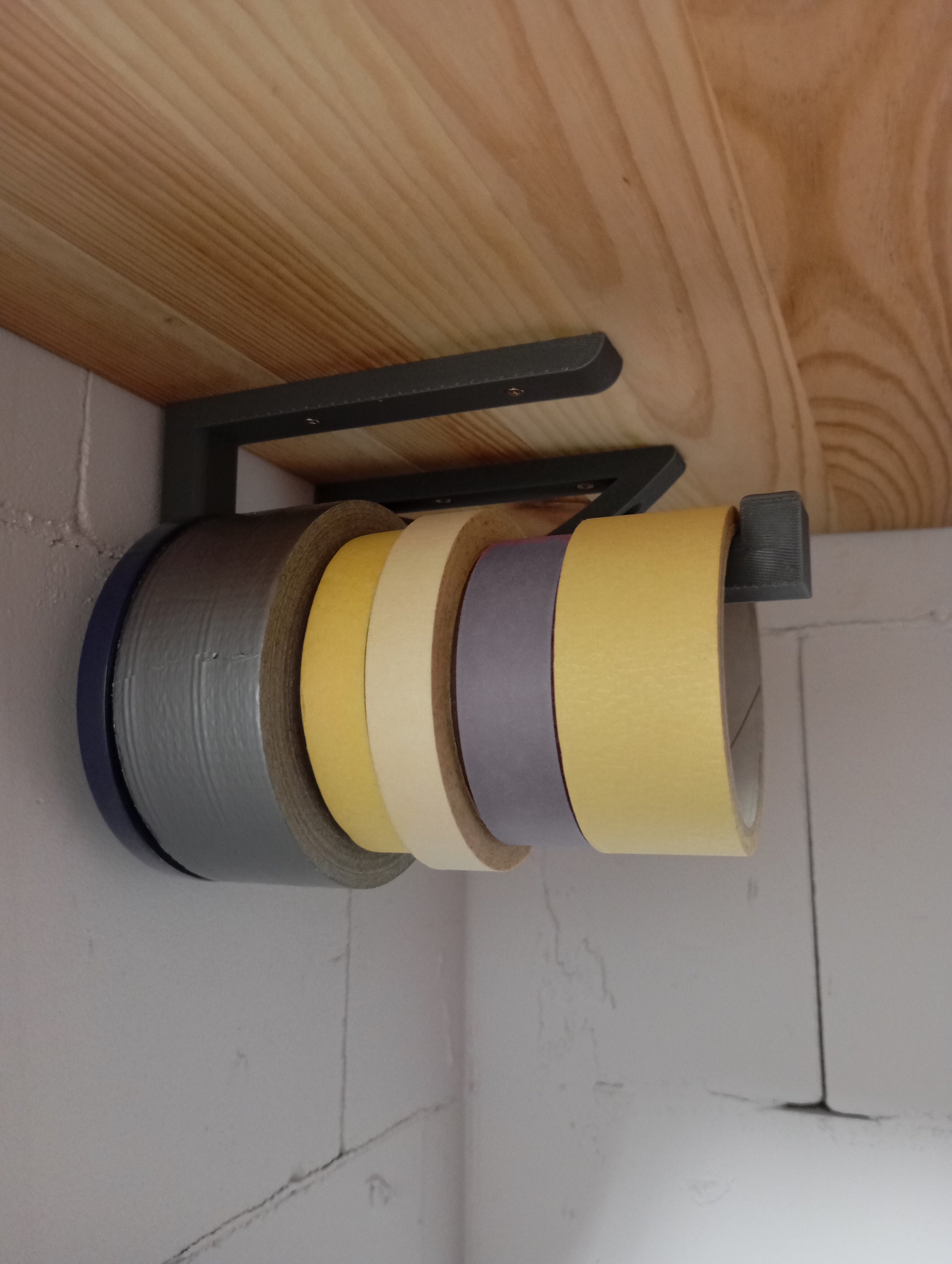 Tape holder top mounted