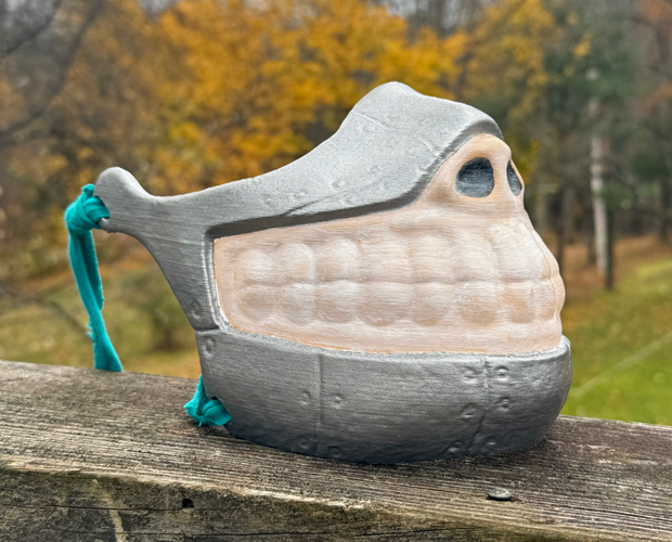 Metal mask withbone teeth