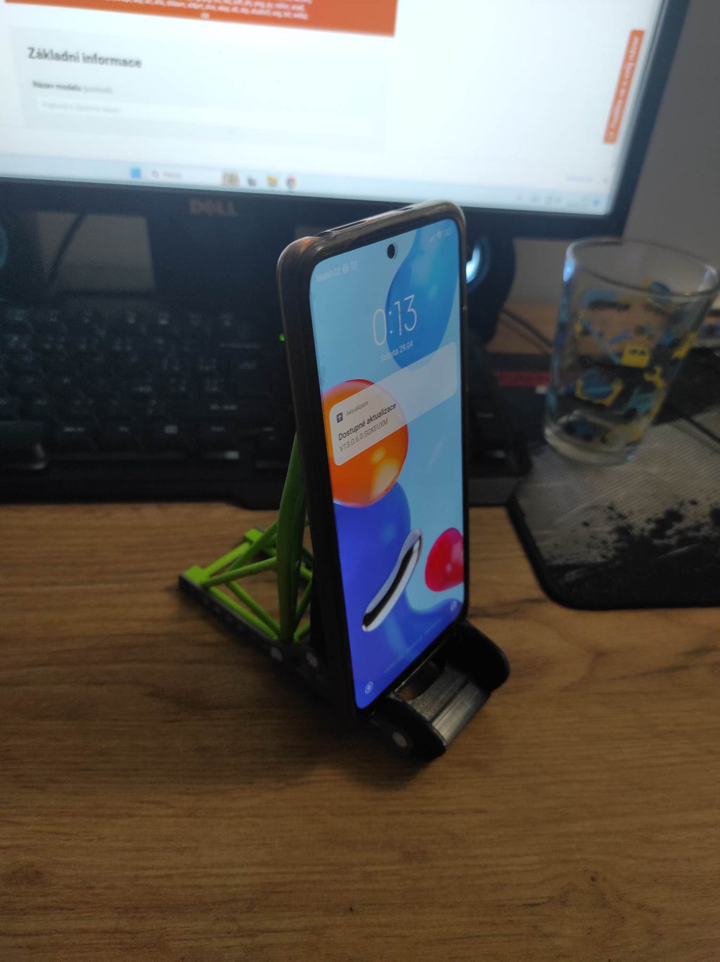 Racing seat phone stand with roll cage