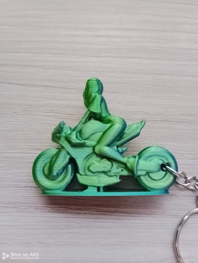 Moto girl keychain