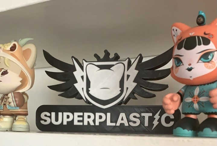 SuperPlastic Badge
