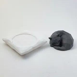 Cute low poly sleeping cat on pillow