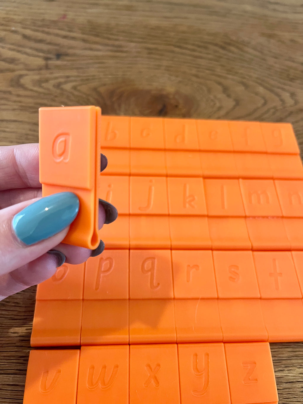 Alphabet embossers lowercase and uppercase