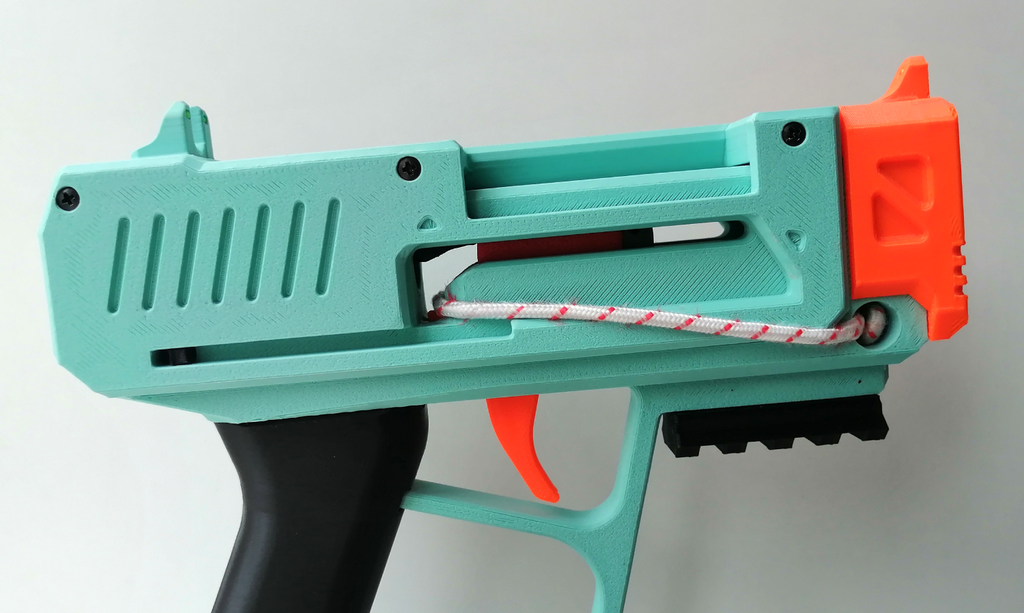 Shell ejecting Nerf string blaster