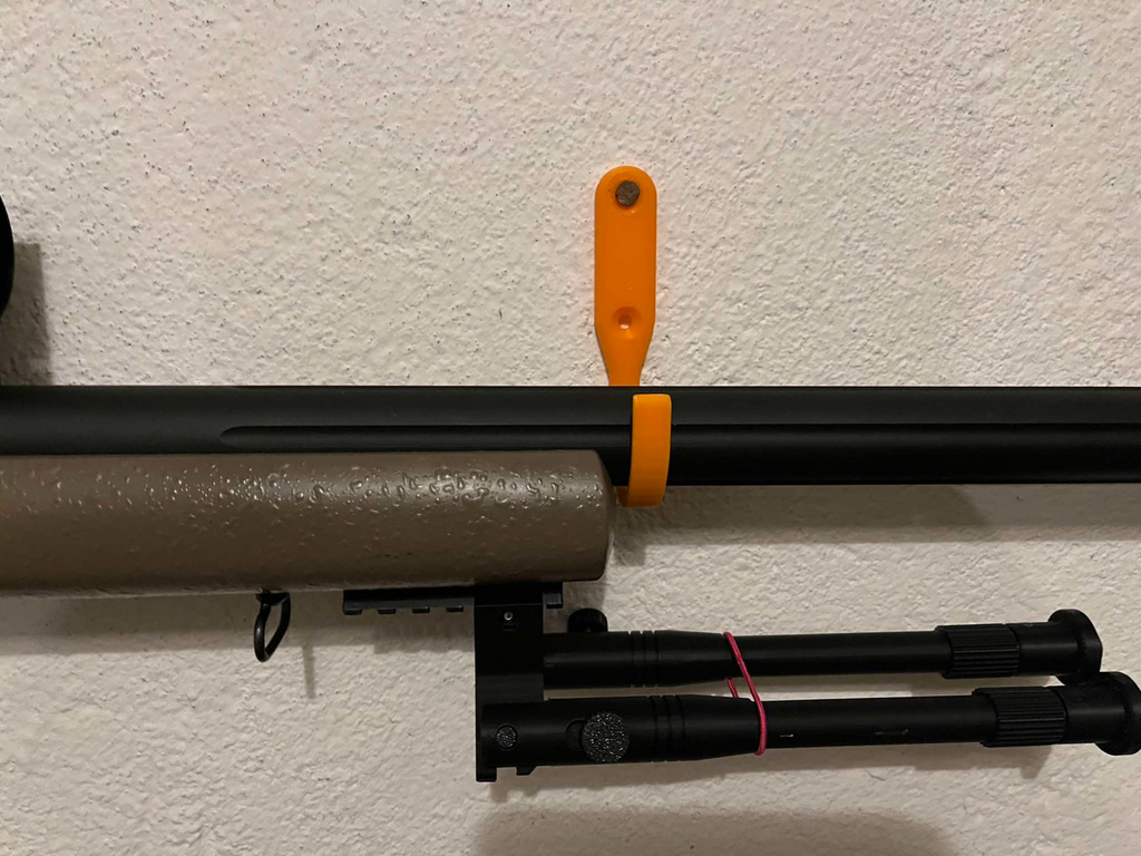 Airsoft gun mounts on the wall