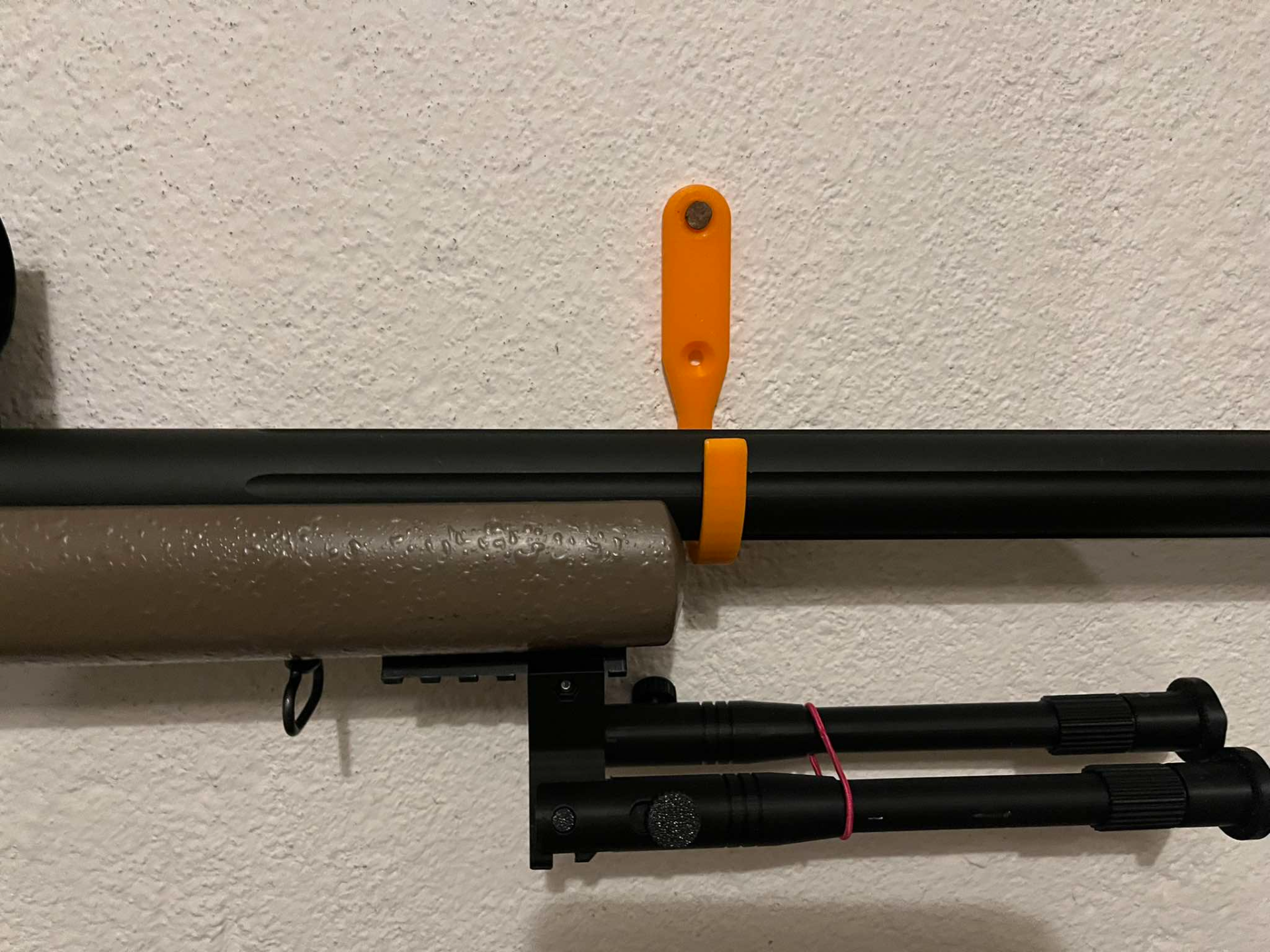 Airsoft gun mounts on the wall