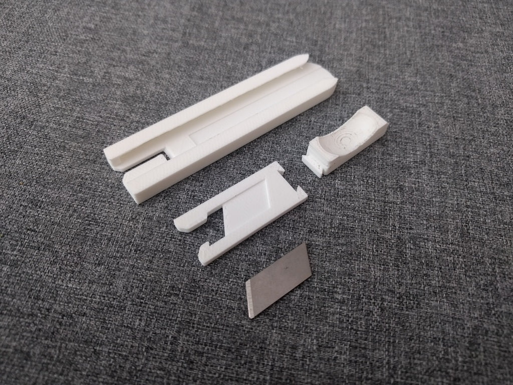 Filament cutter (only 18mm snap off blade needed)