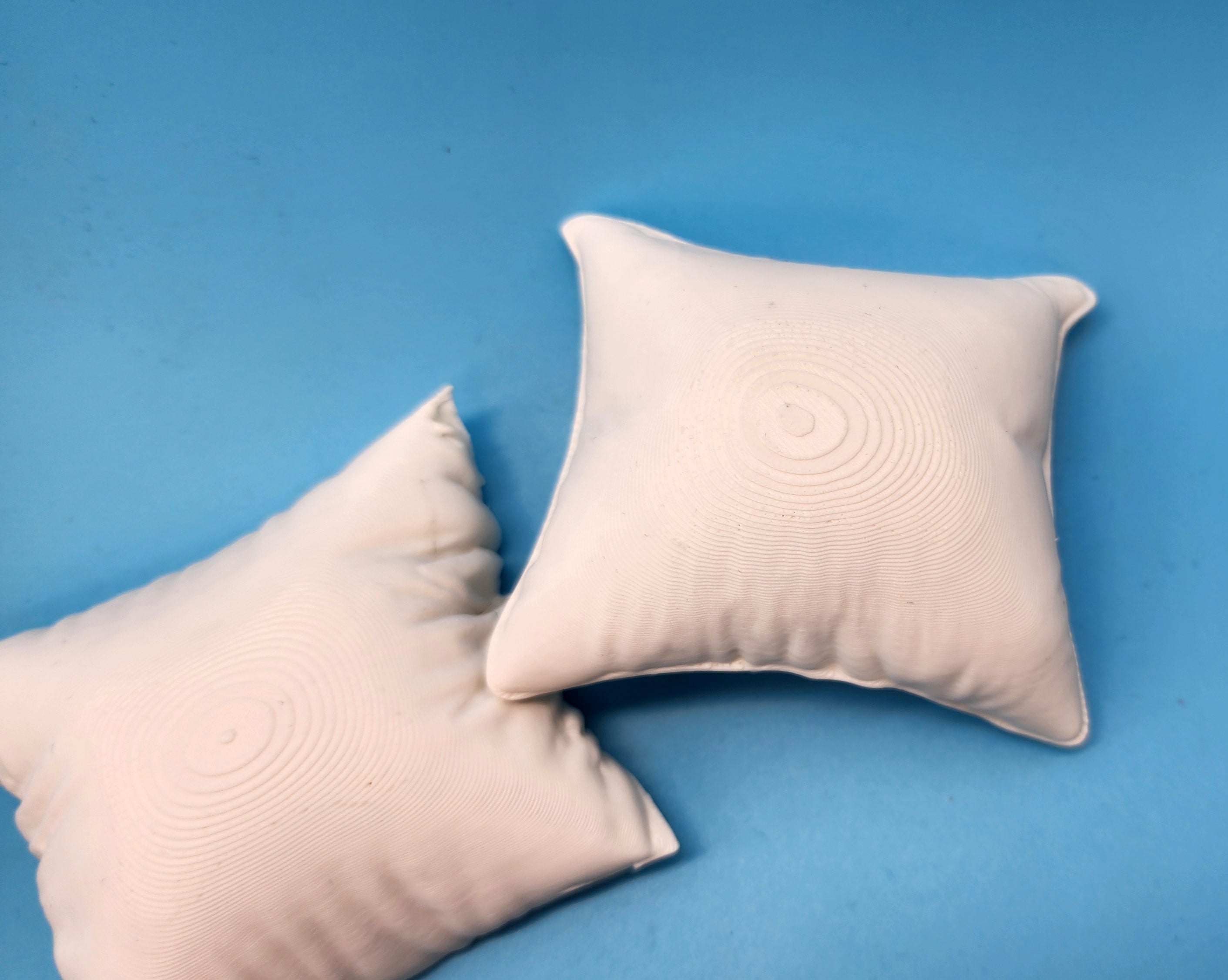 2 Fluffy Square Pillows