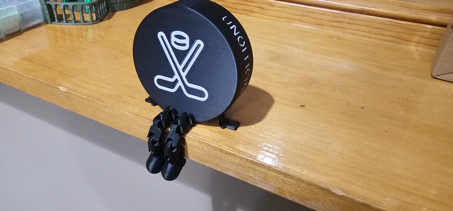 Articulated Hockey Puck Buddie