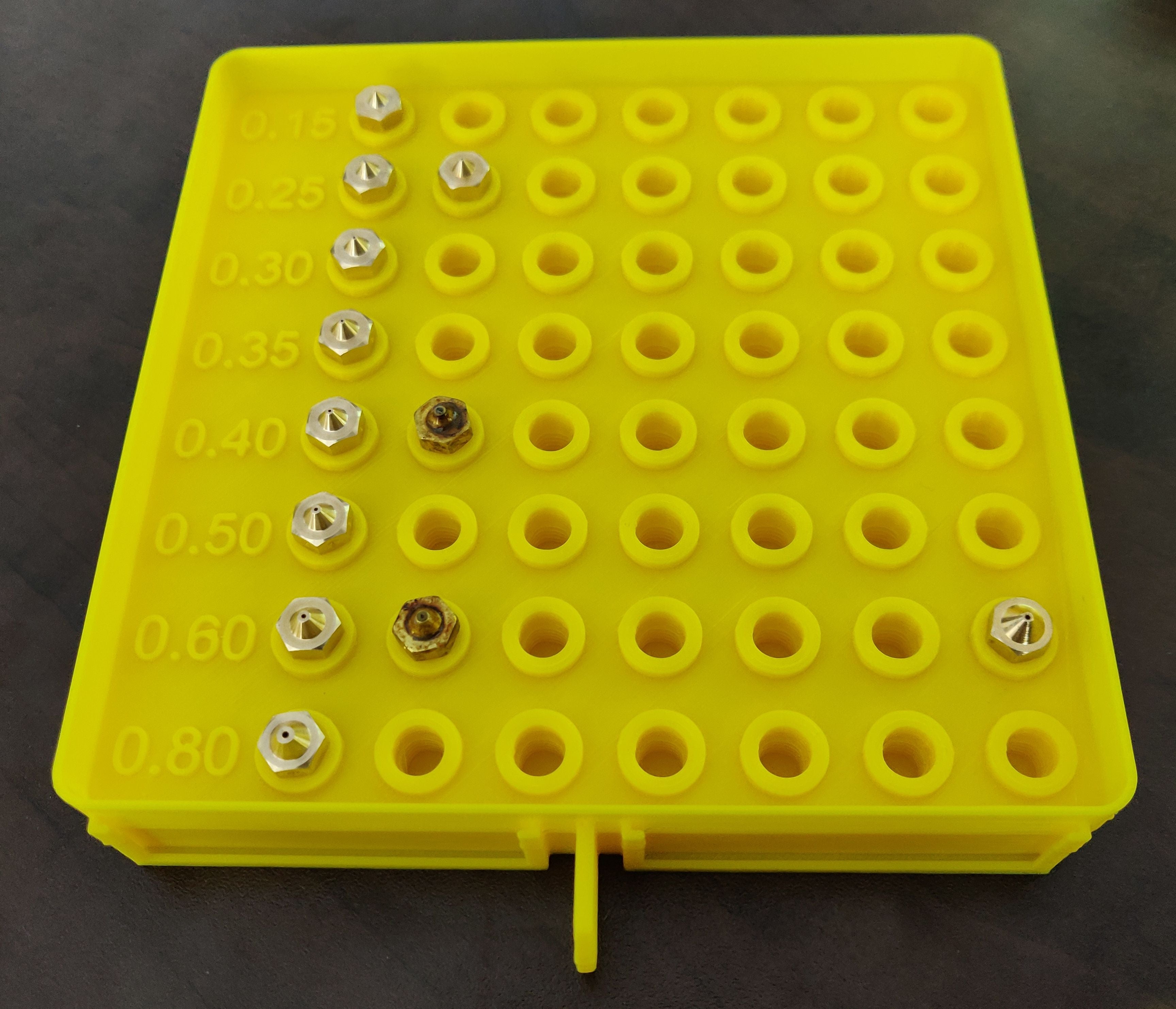 Threaded Nozzle Storage for Ultimate Drawer System