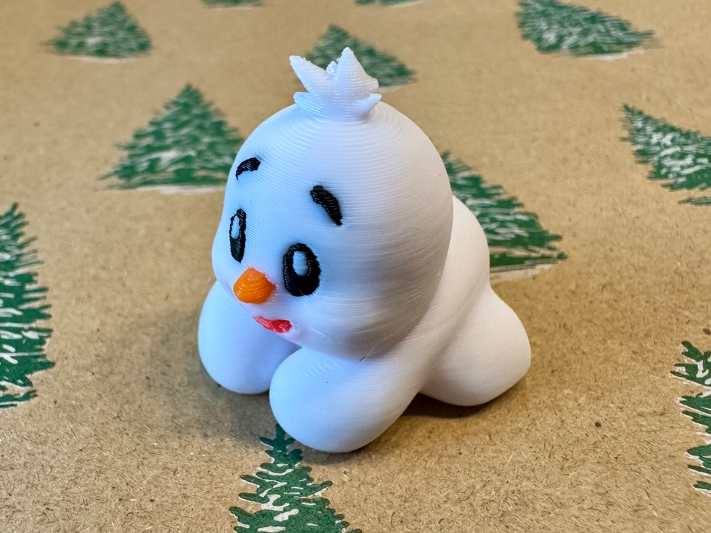 Niedlicher liegender Baby-Schneemann