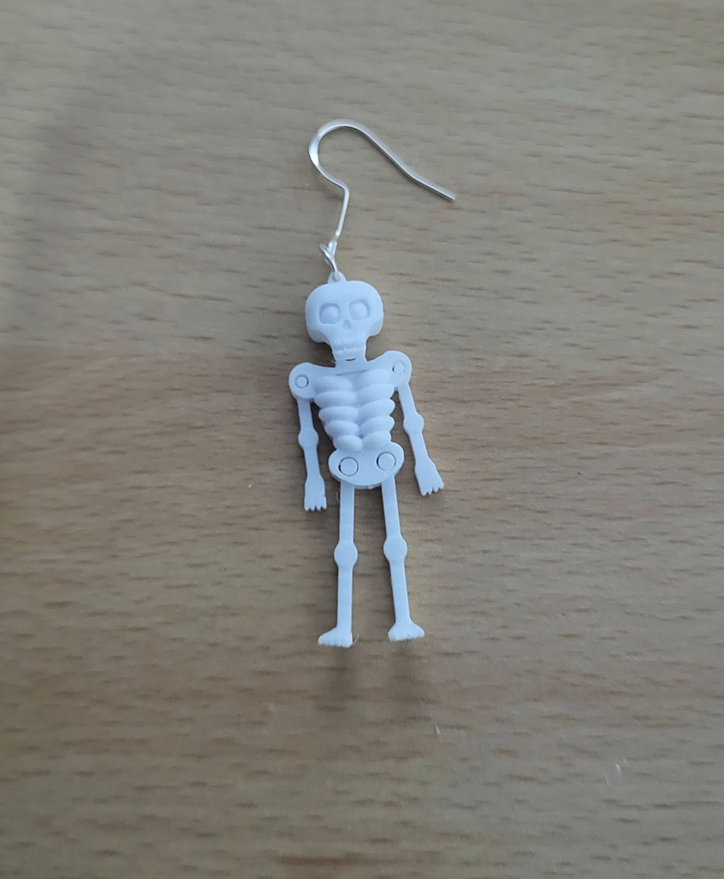 skeleton earring articulated