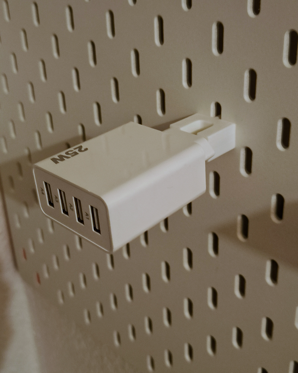 IKEA Skadis pegboard: EU phone charger holders